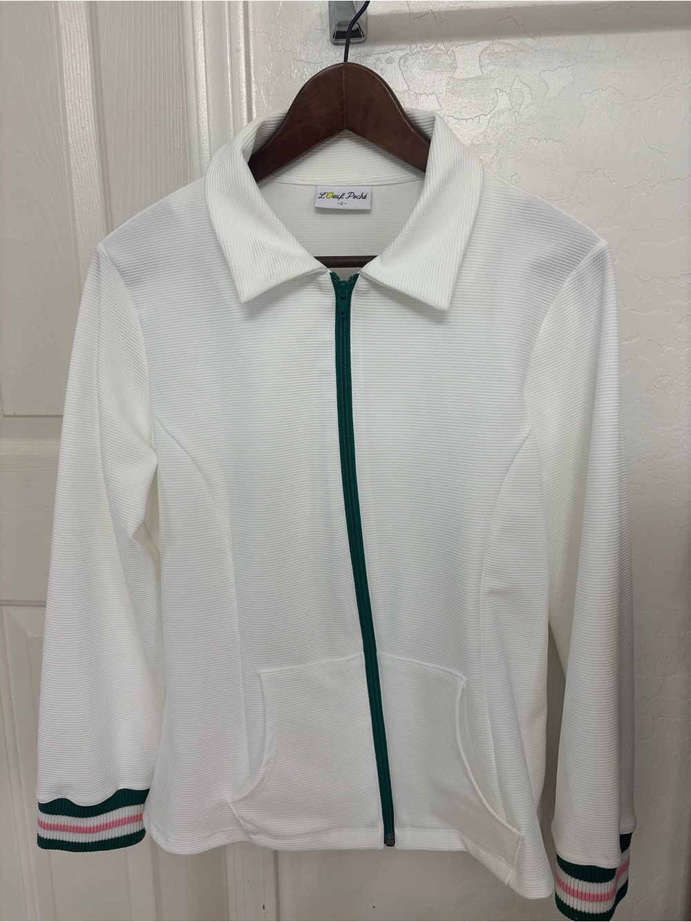 White athletic tennis Jacket with Green Zip and Striped Cuff Detail